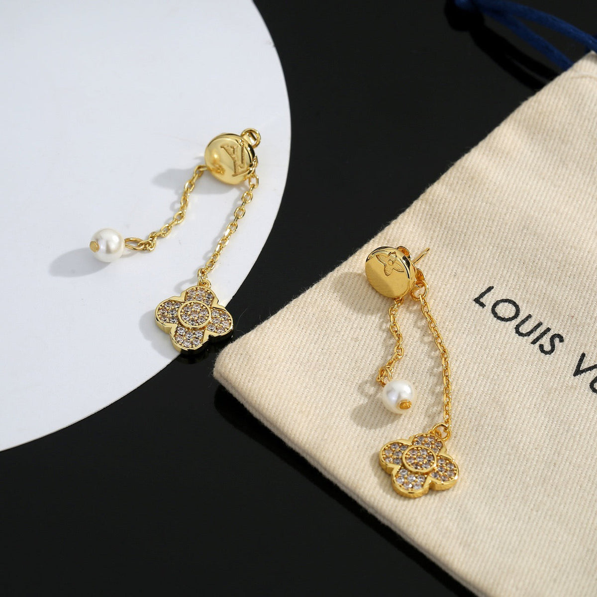 Martin Graham stud earrings in polished metal-tone – styled product view