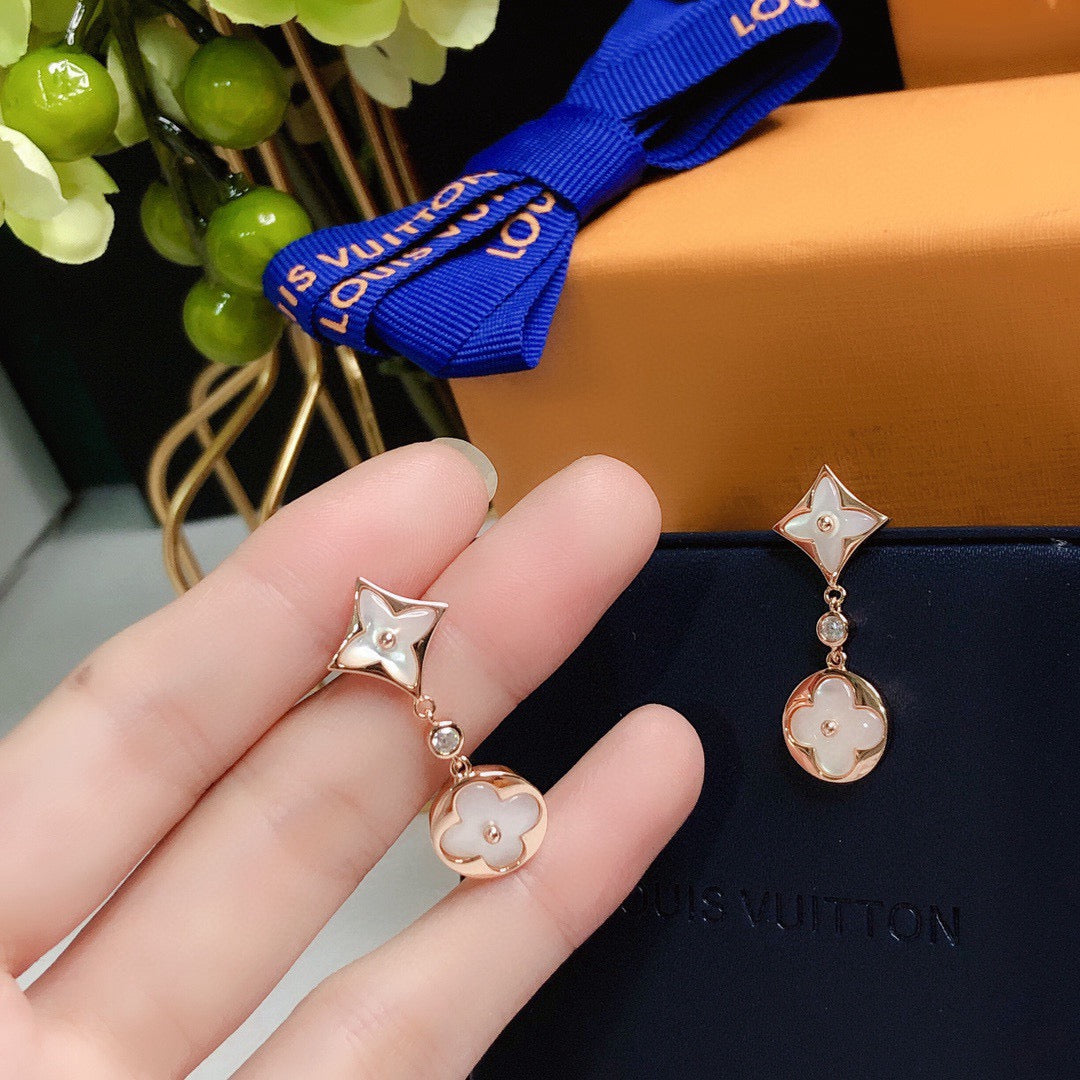 Martin Graham stud earrings in polished metal-tone – detail view