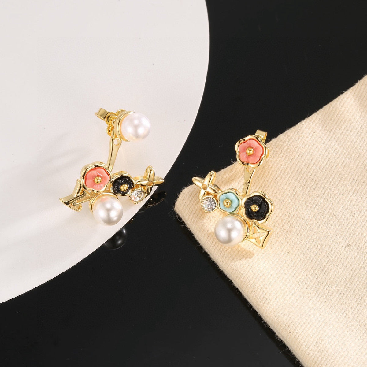 Martin Graham stud earrings in polished metal-tone – front product view