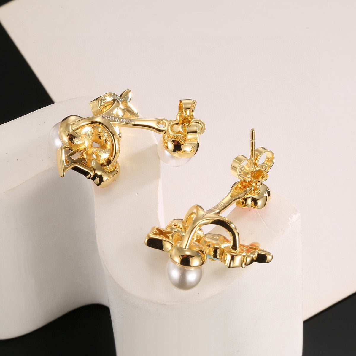 Martin Graham stud earrings in polished metal-tone – main product view