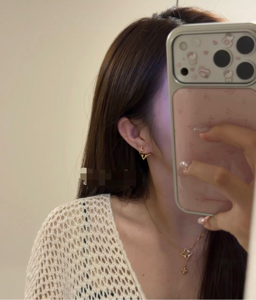 Martin Graham stud earrings in polished metal-tone – styled product view