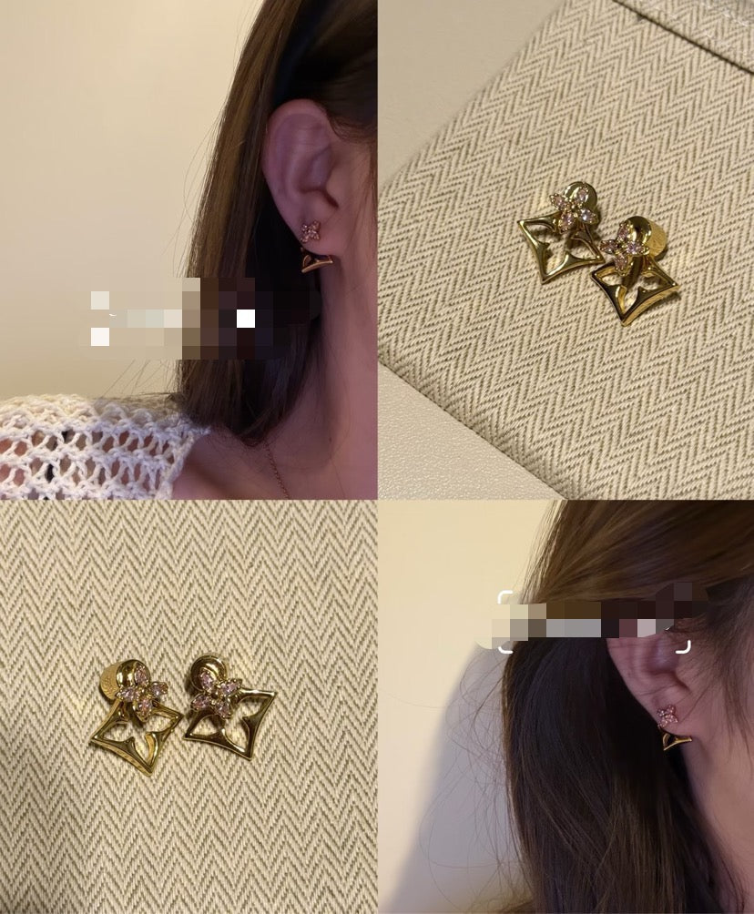 Martin Graham stud earrings in polished metal-tone – close-up detail