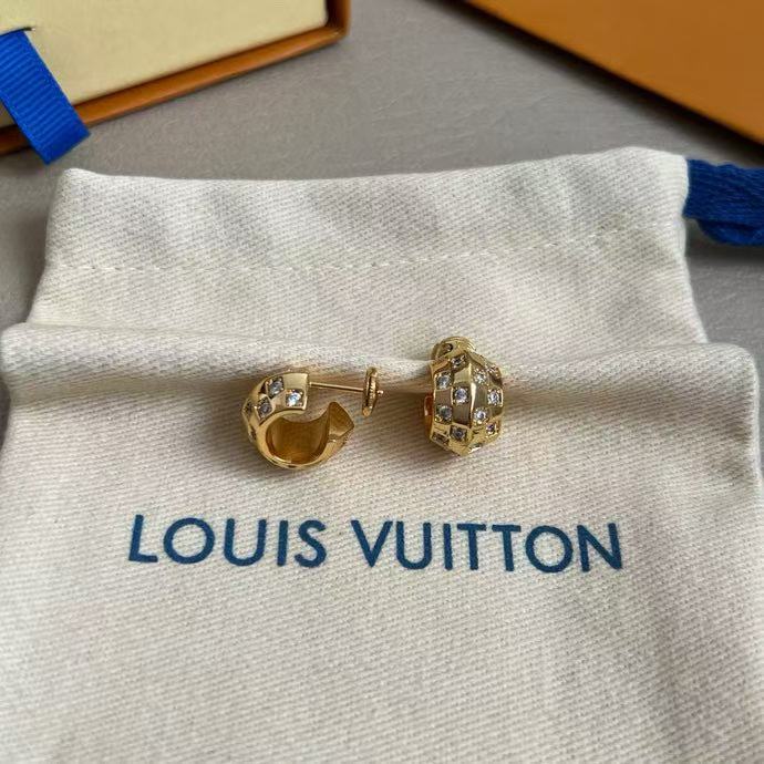 Martin Graham stud earrings in polished metal-tone – styled product view