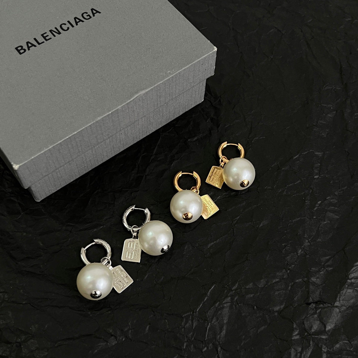 Martin Graham earrings in polished metal-tone – detail view