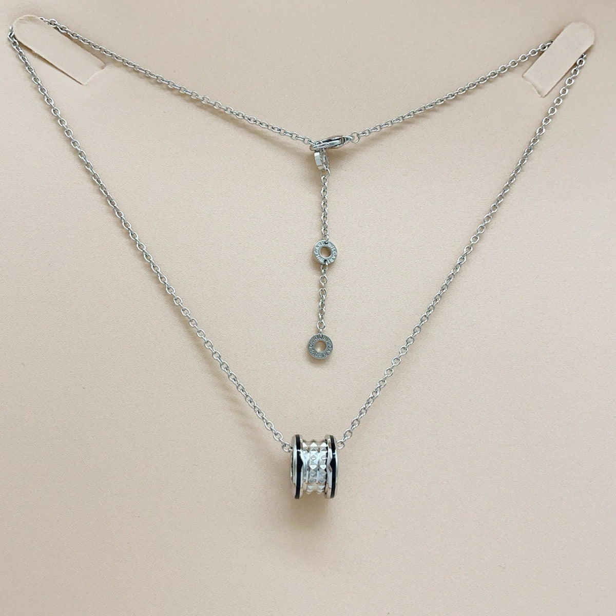 Martin Graham pendant necklace in polished metal-tone – styled product view