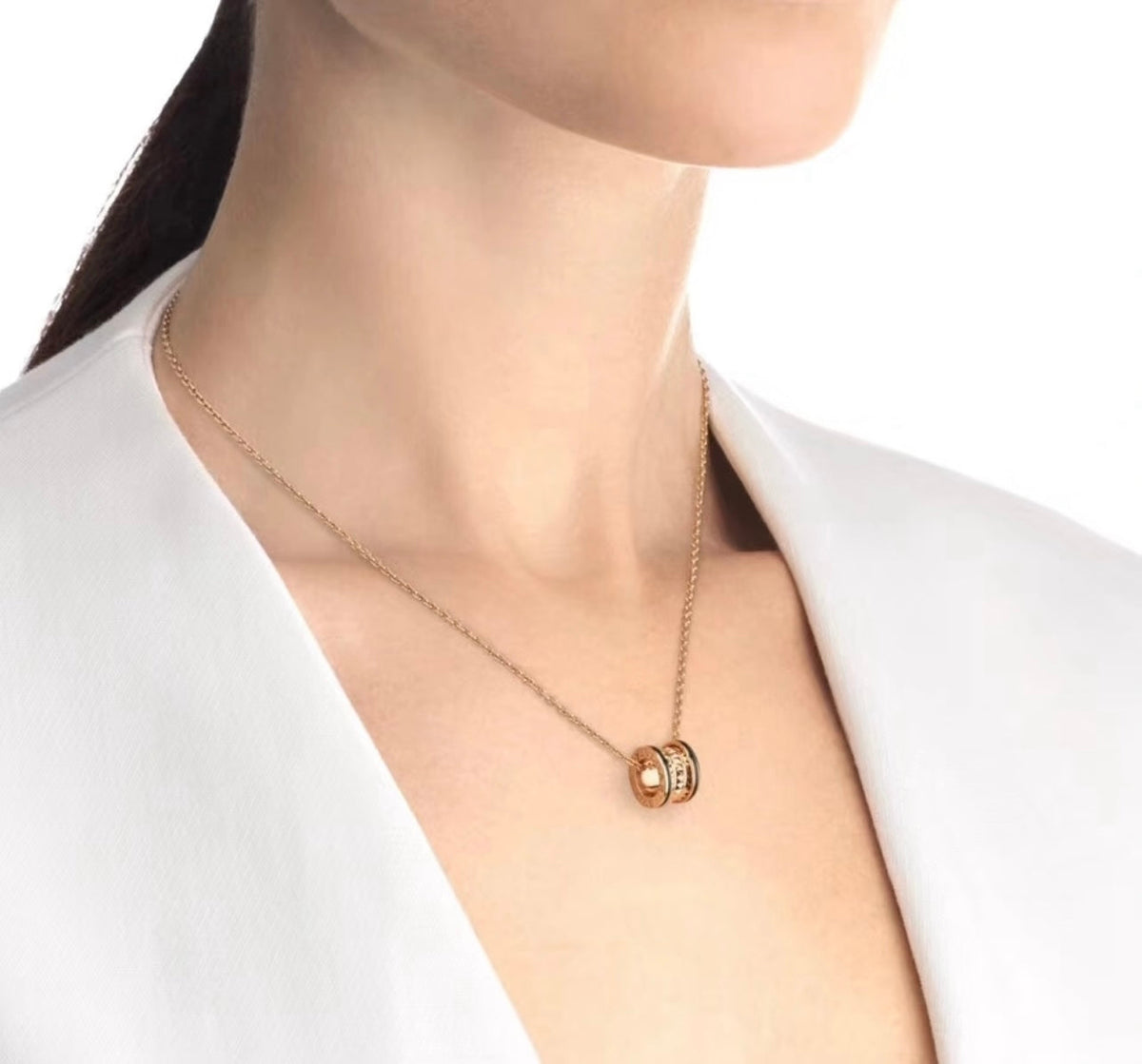 Martin Graham pendant necklace in polished metal-tone – side detail