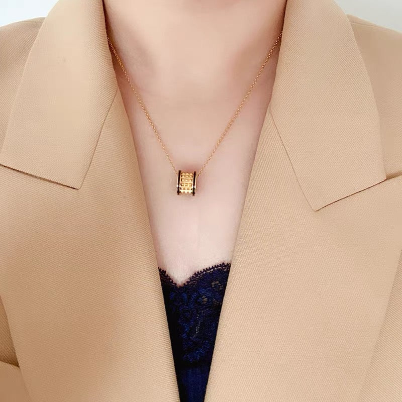 Martin Graham pendant necklace in polished metal-tone – detail view