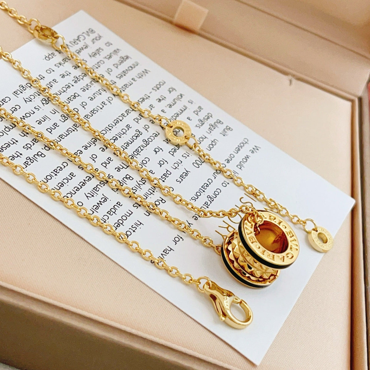 Martin Graham pendant necklace in polished metal-tone – detail view
