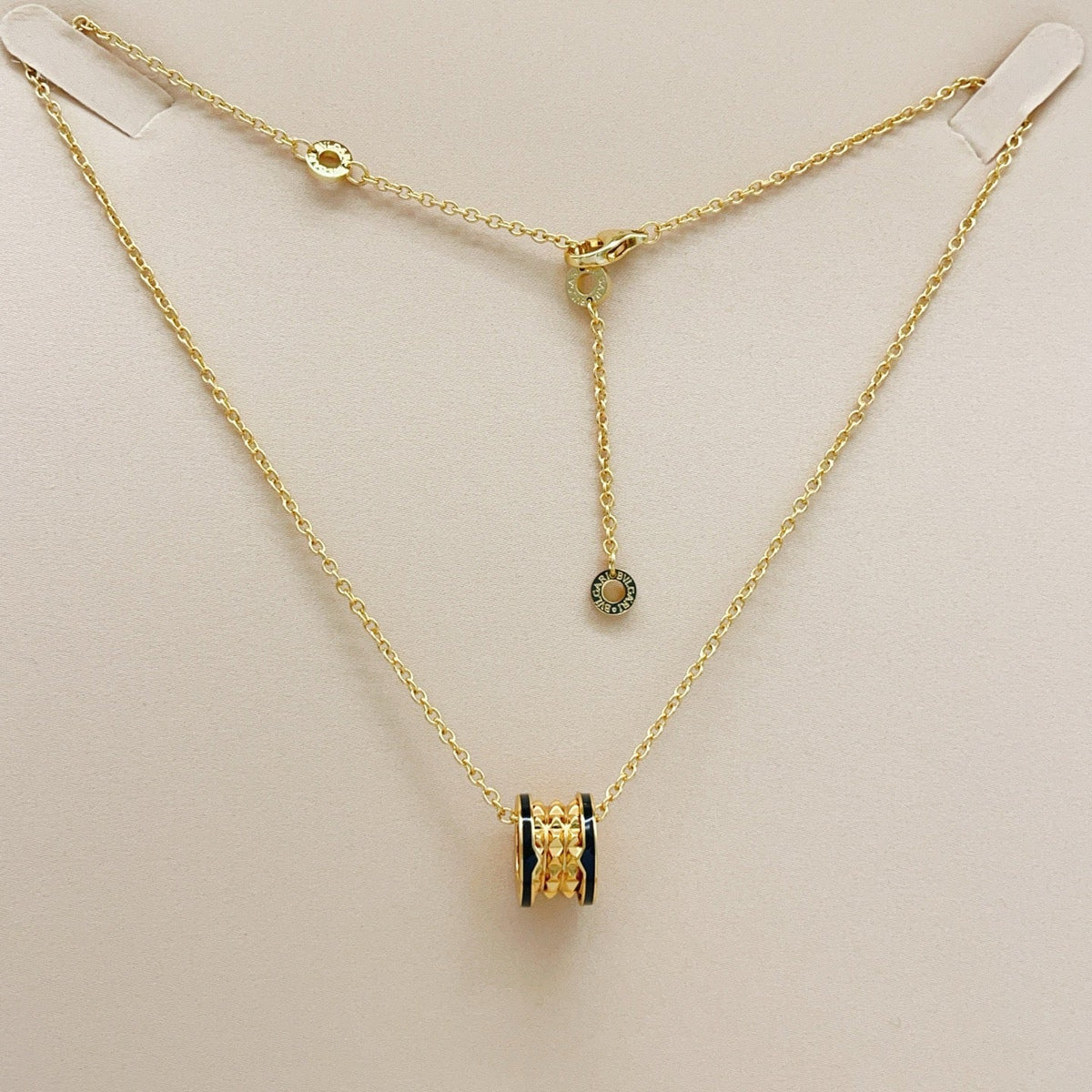 Martin Graham pendant necklace in polished metal-tone – styled product view