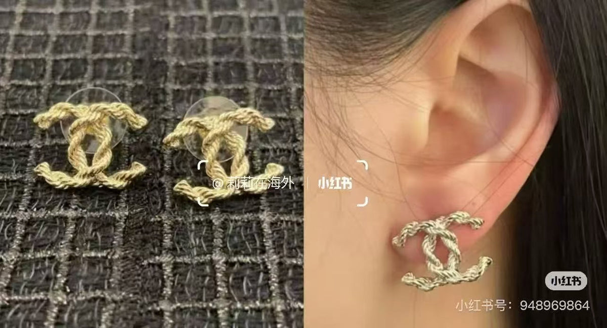 Martin Graham stud earrings in polished metal-tone – front product view