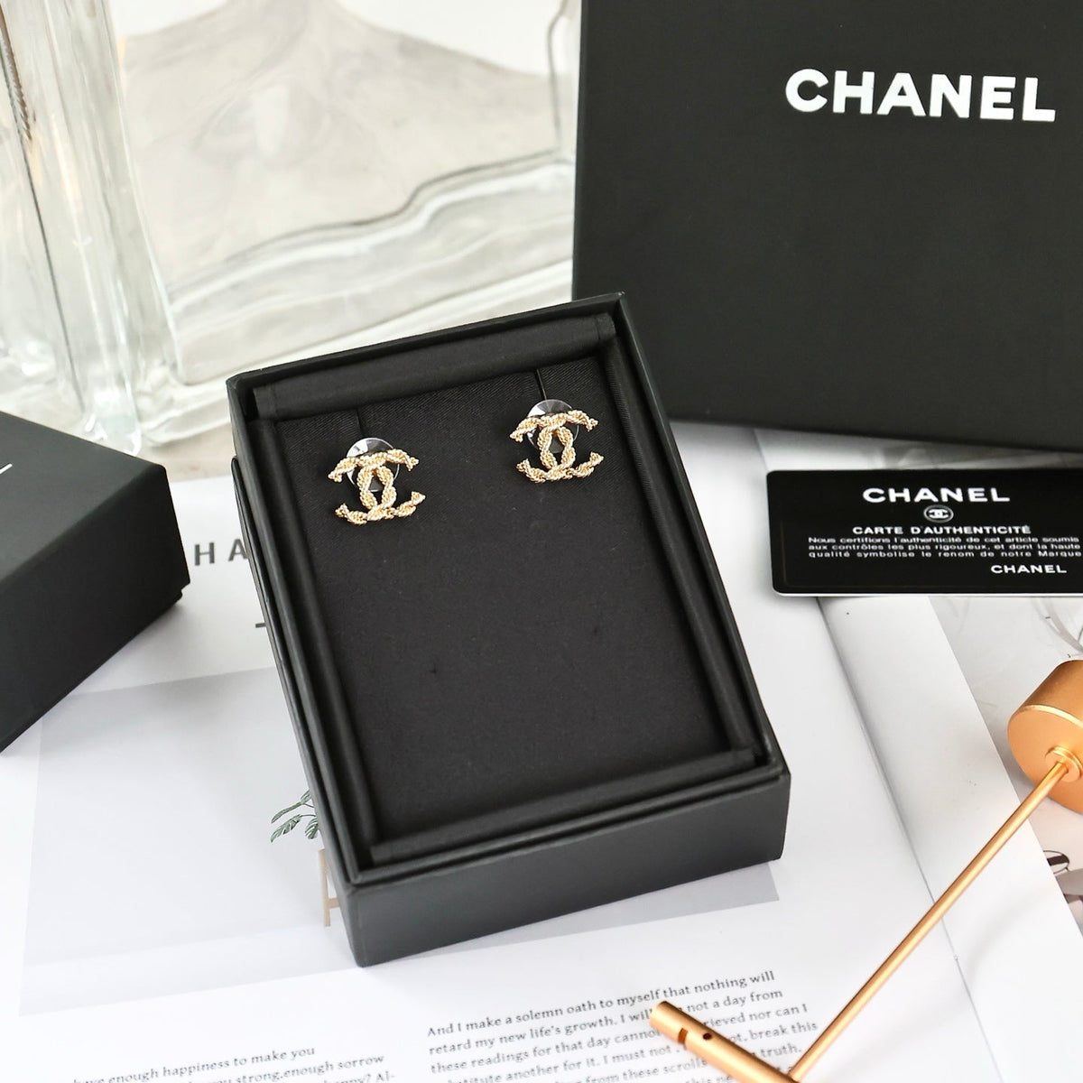 Martin Graham stud earrings in polished metal-tone – styled product view