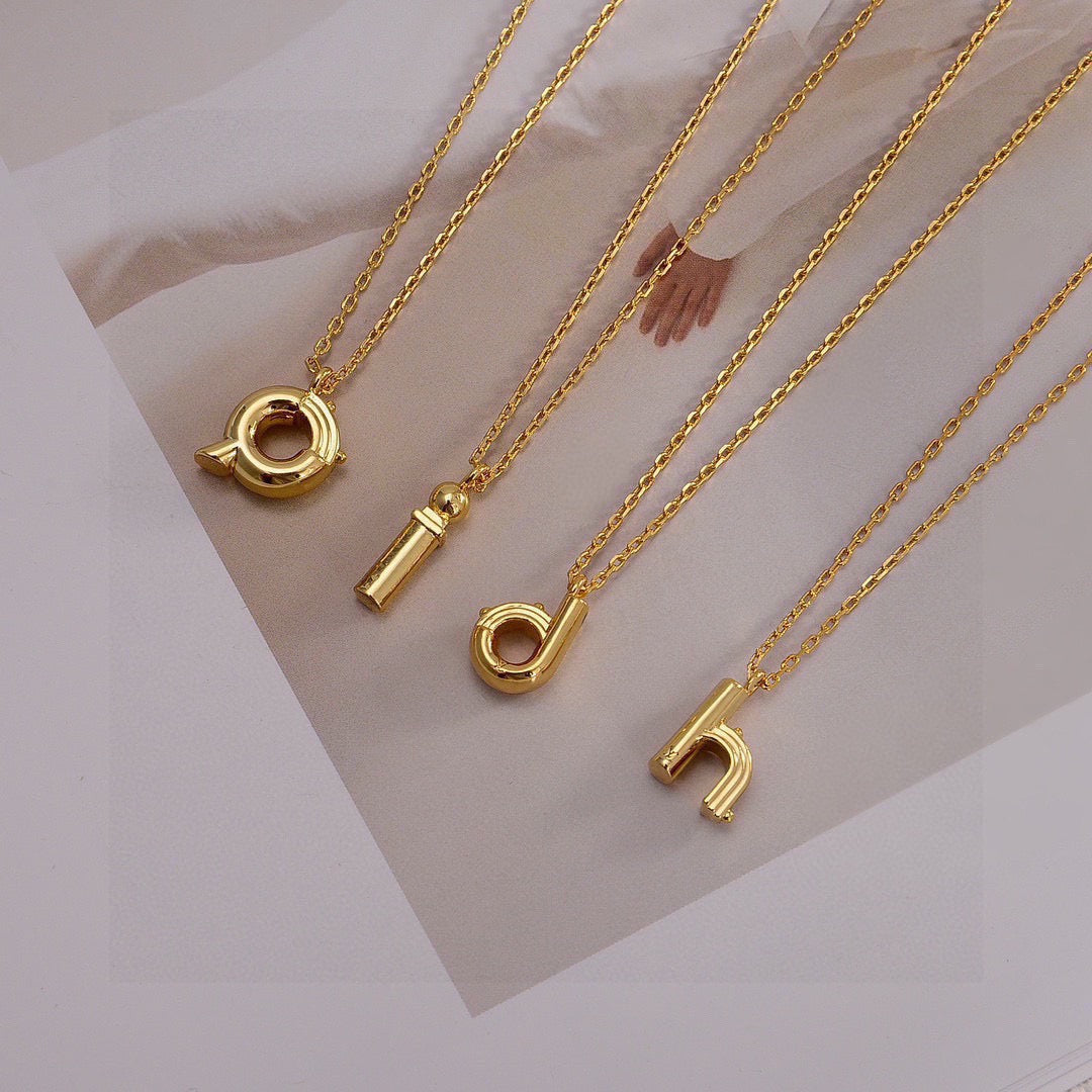 Martin Graham pendant necklace in polished metal-tone – front product view