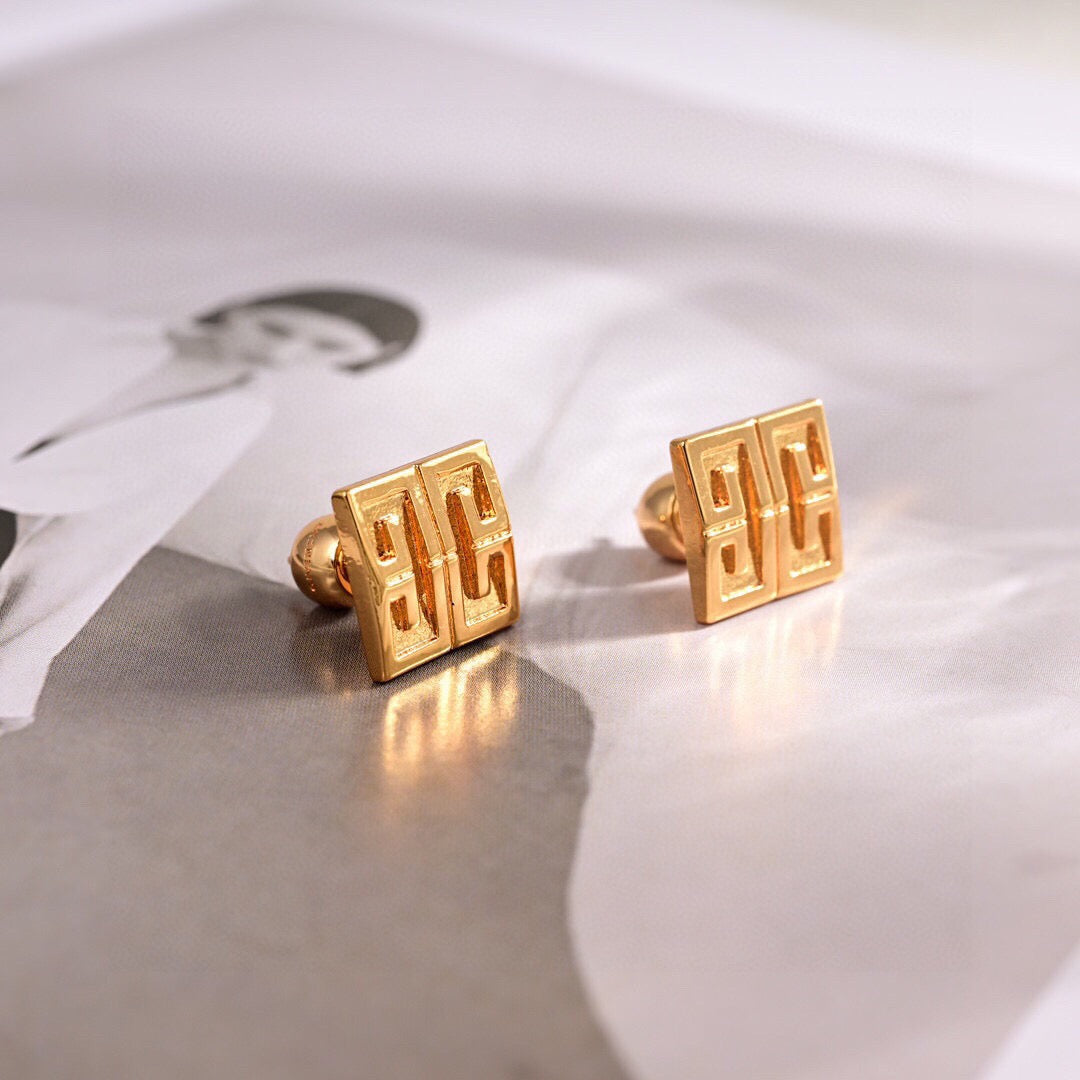 Martin Graham stud earrings in polished metal-tone – main product view