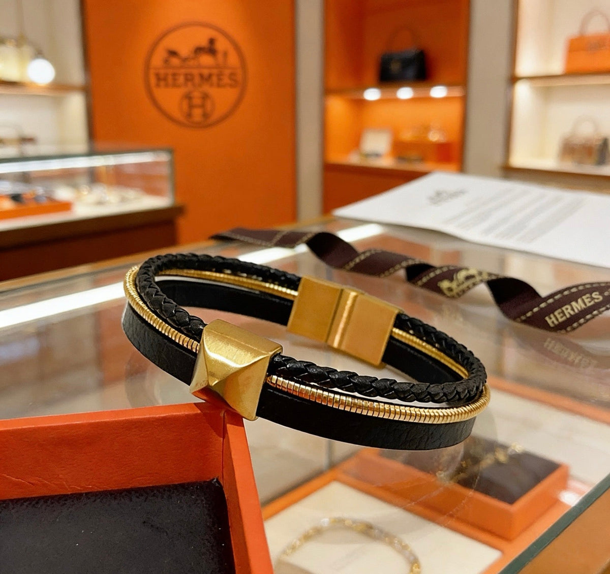 Martin Graham bangle in polished metal-tone – styled product view