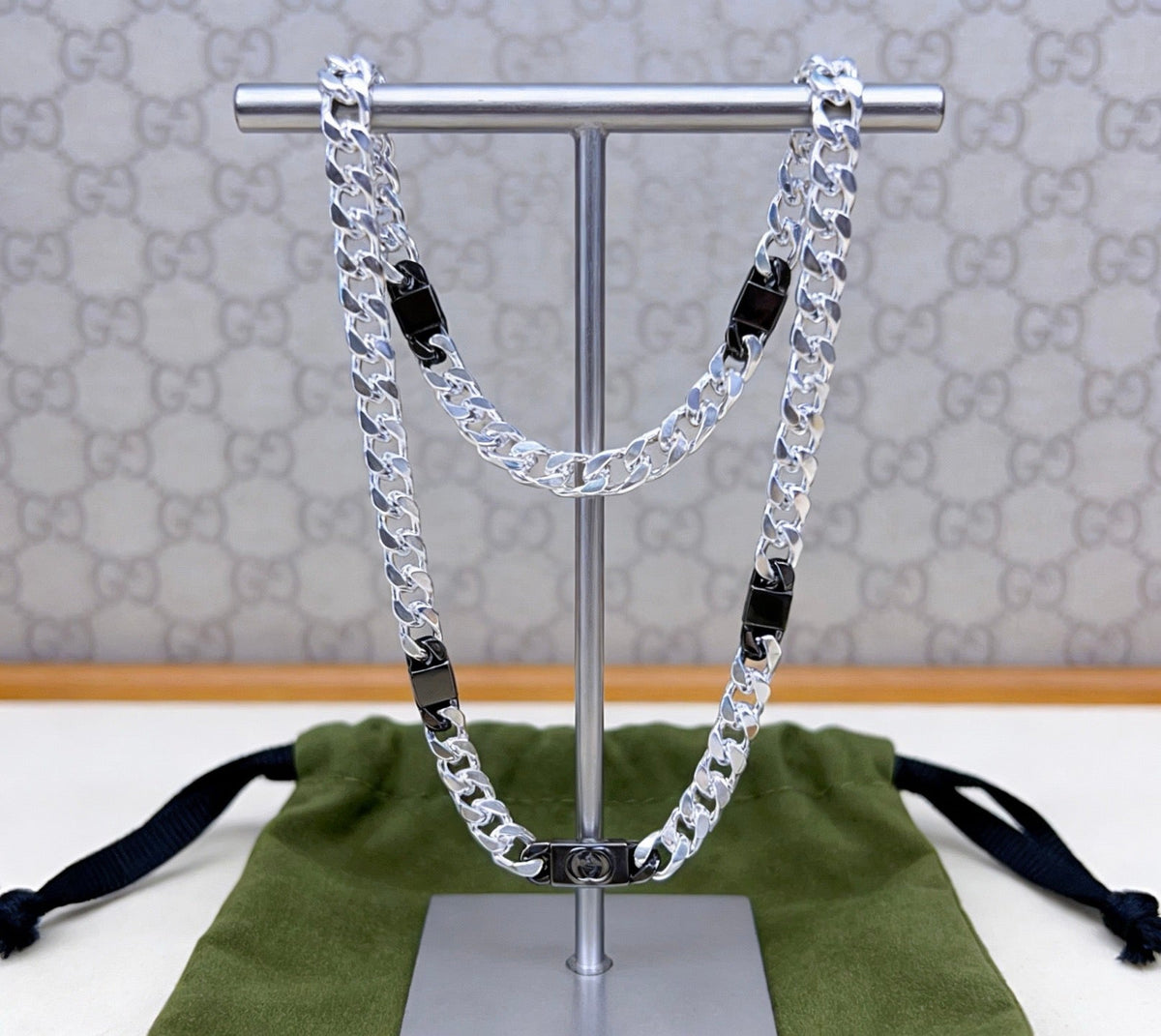 Martin Graham pendant necklace in polished metal-tone – detail view