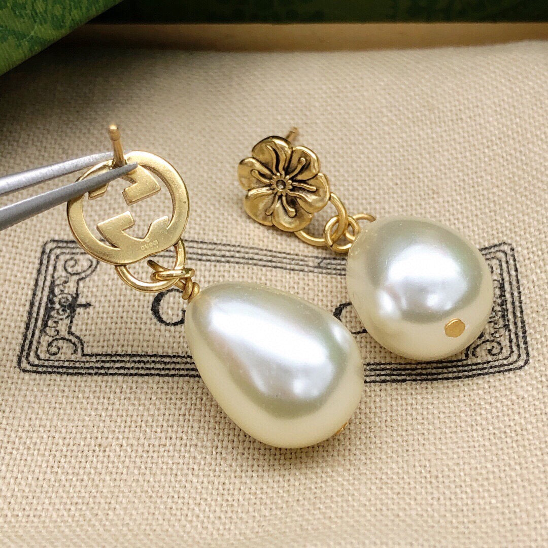 Martin Graham earrings in polished metal-tone – side detail