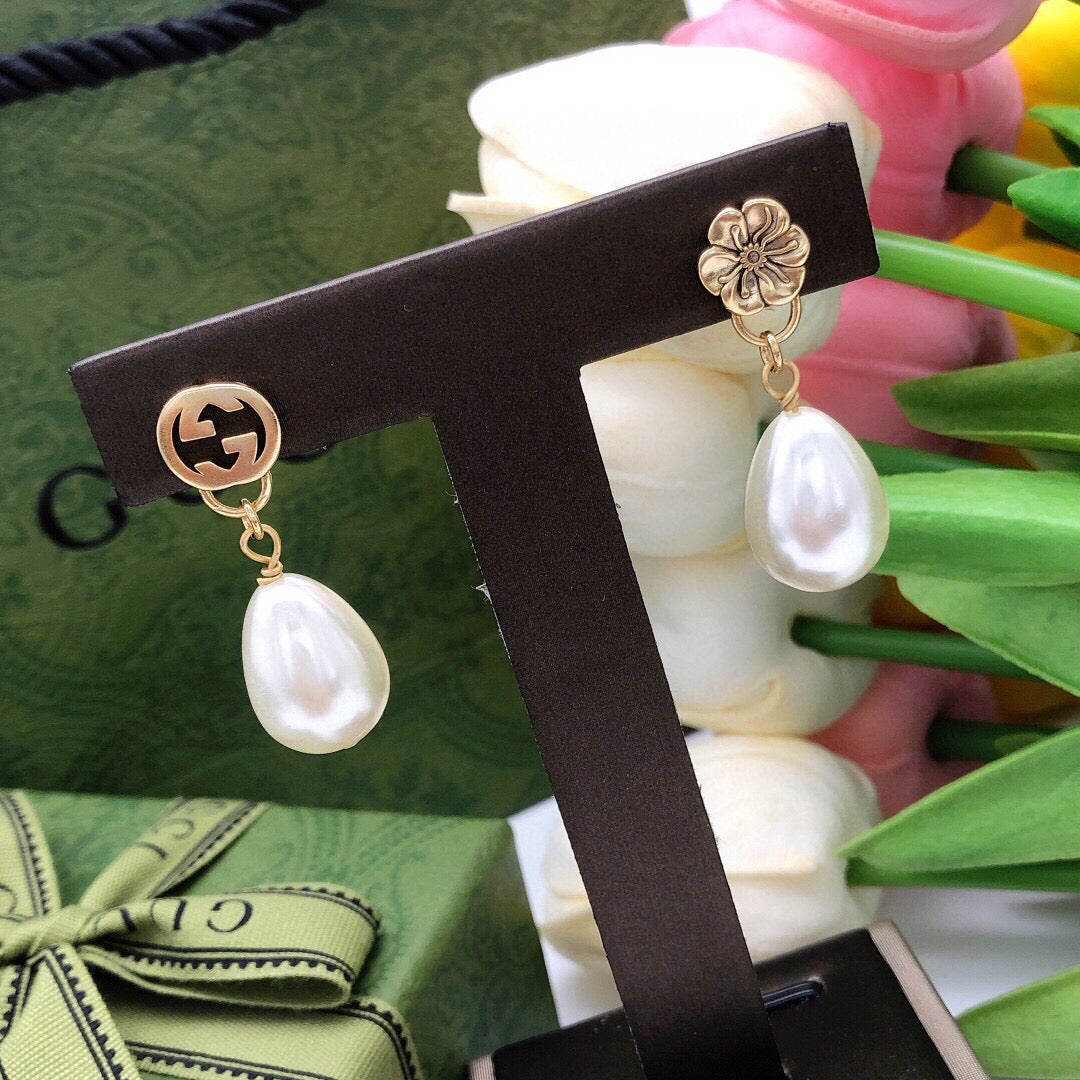 Martin Graham earrings in polished metal-tone – styled product view