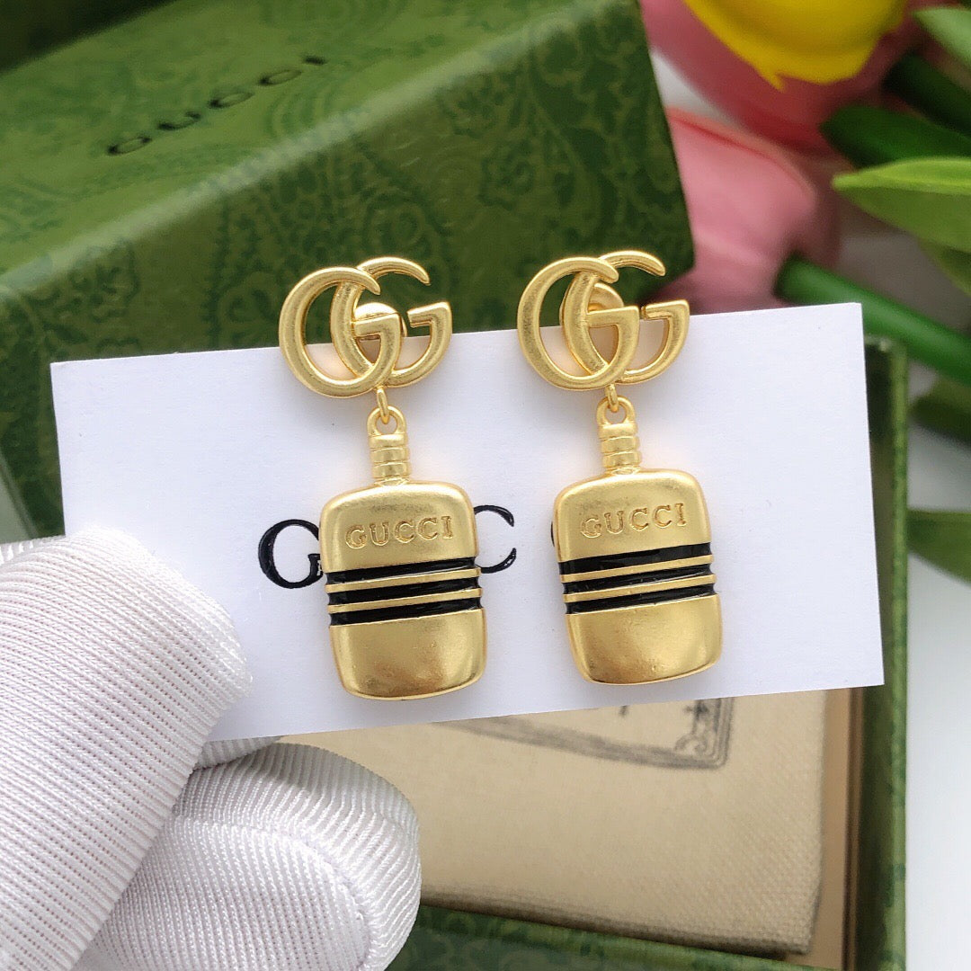 Martin Graham stud earrings in polished metal-tone – main product view