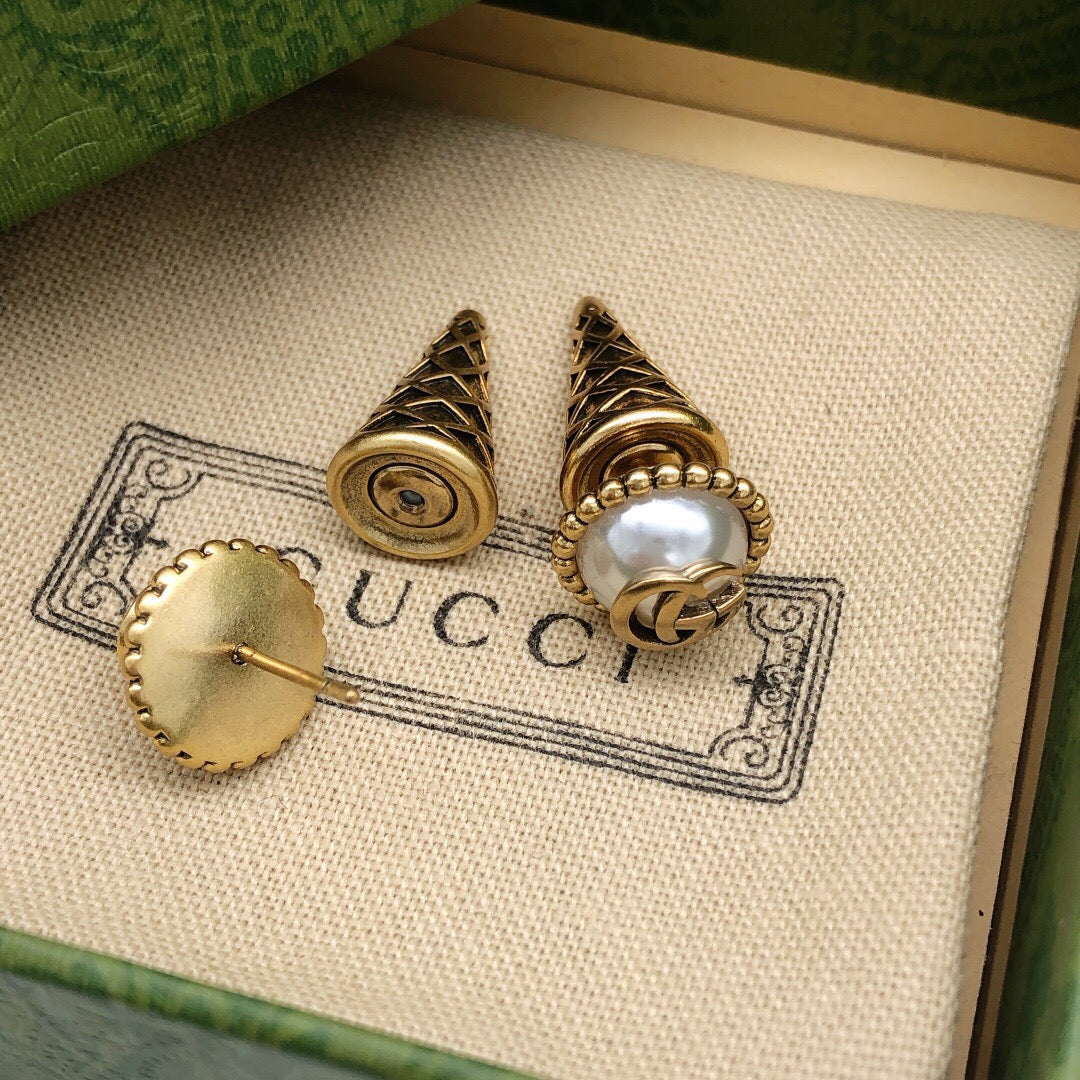 Martin Graham stud earrings in polished metal-tone – front product view