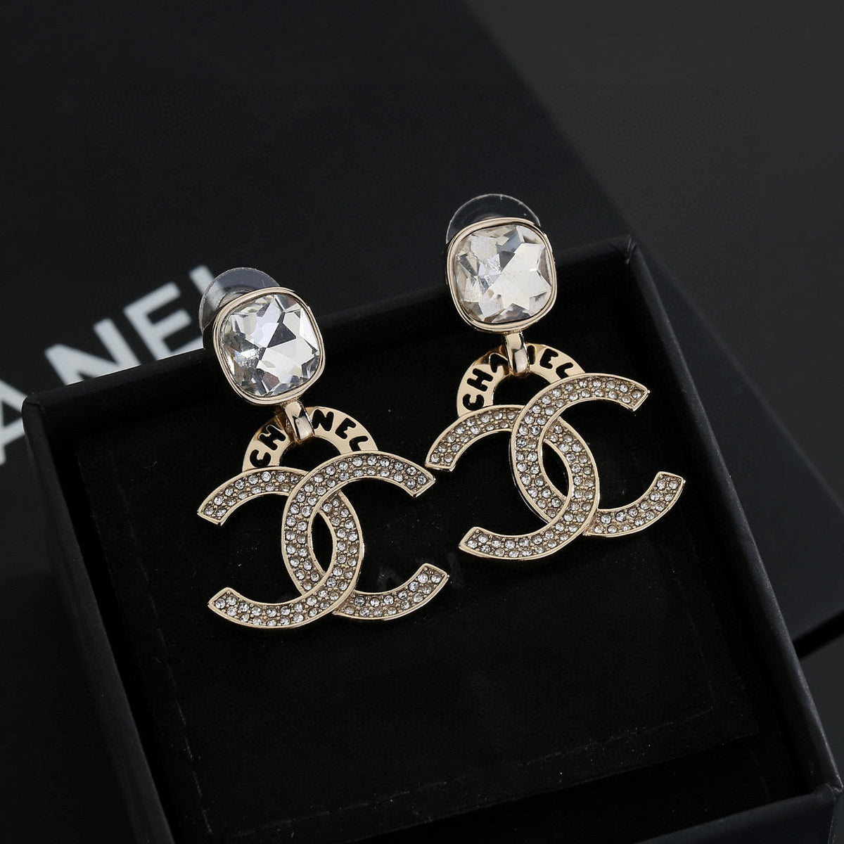 Martin Graham stud earrings in polished metal-tone – front product view
