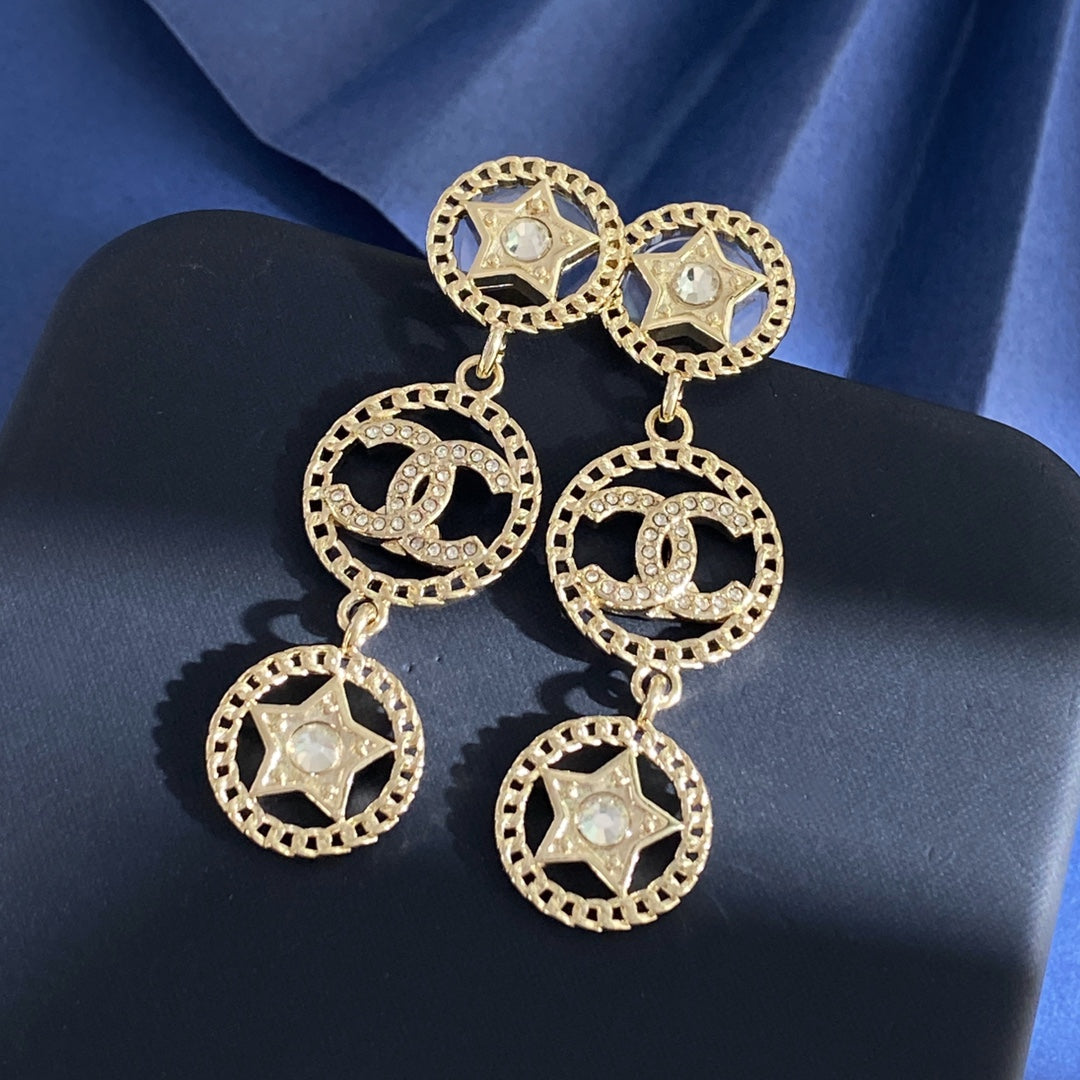 Martin Graham stud earrings in polished metal-tone – front product view