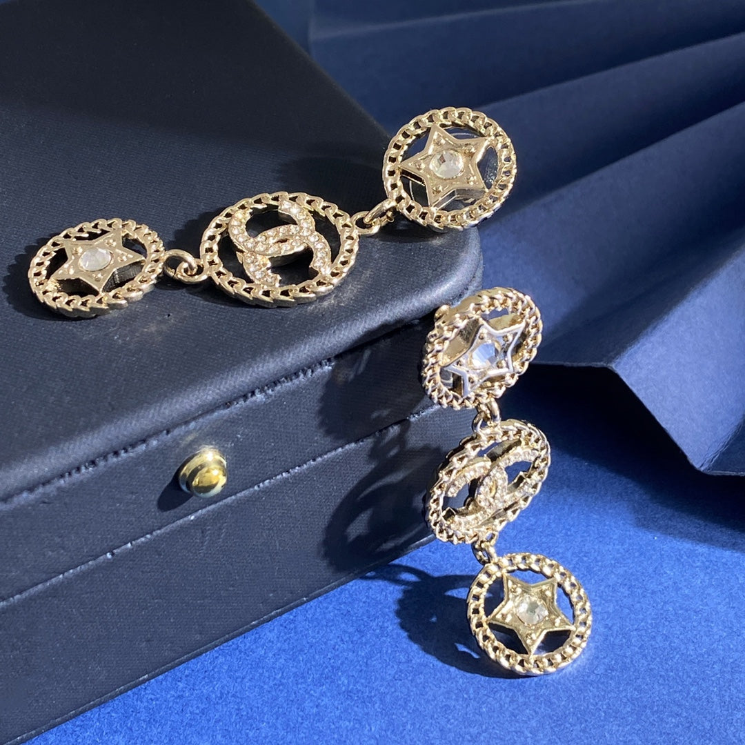 Martin Graham stud earrings in polished metal-tone – detail view