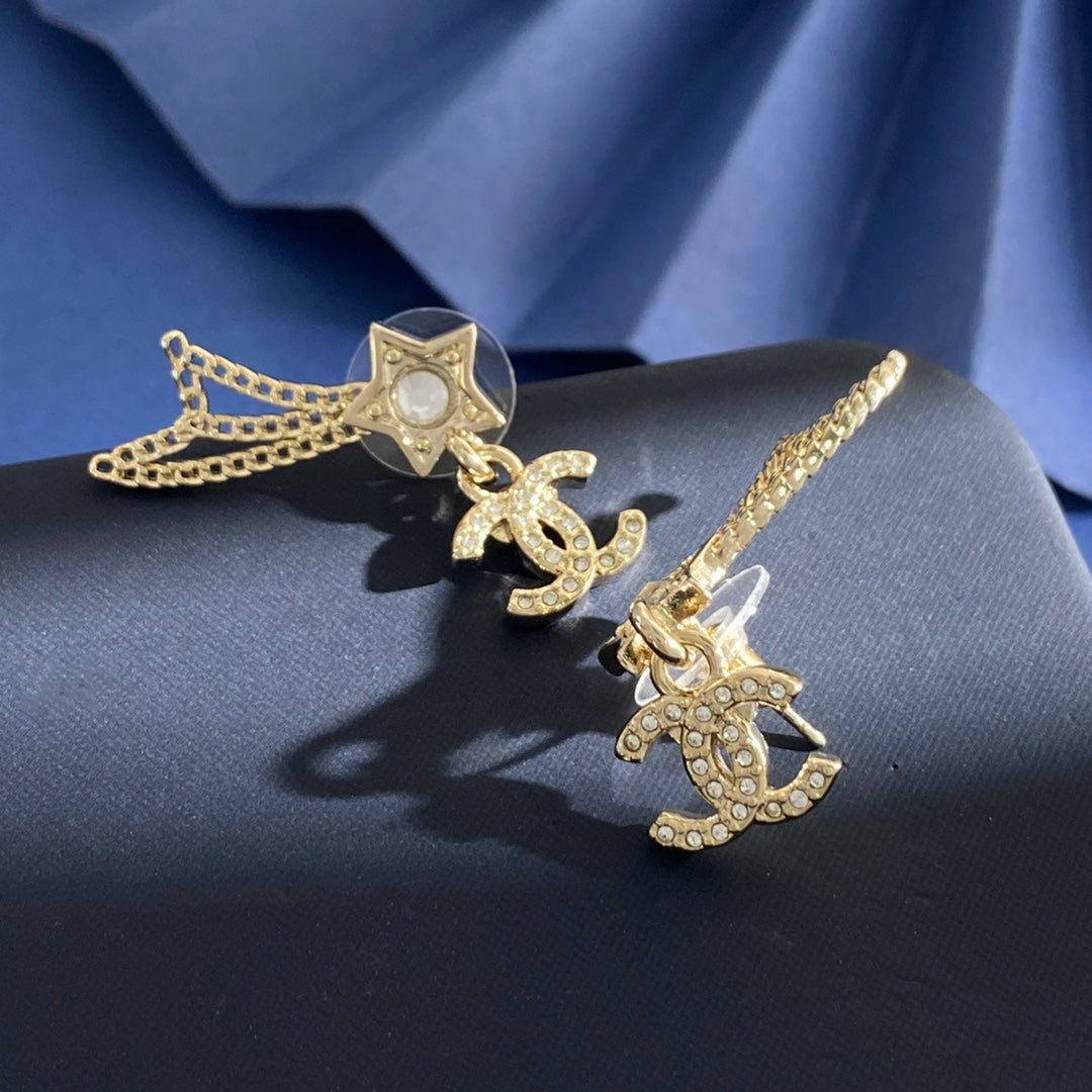 Martin Graham stud earrings in polished metal-tone – side detail