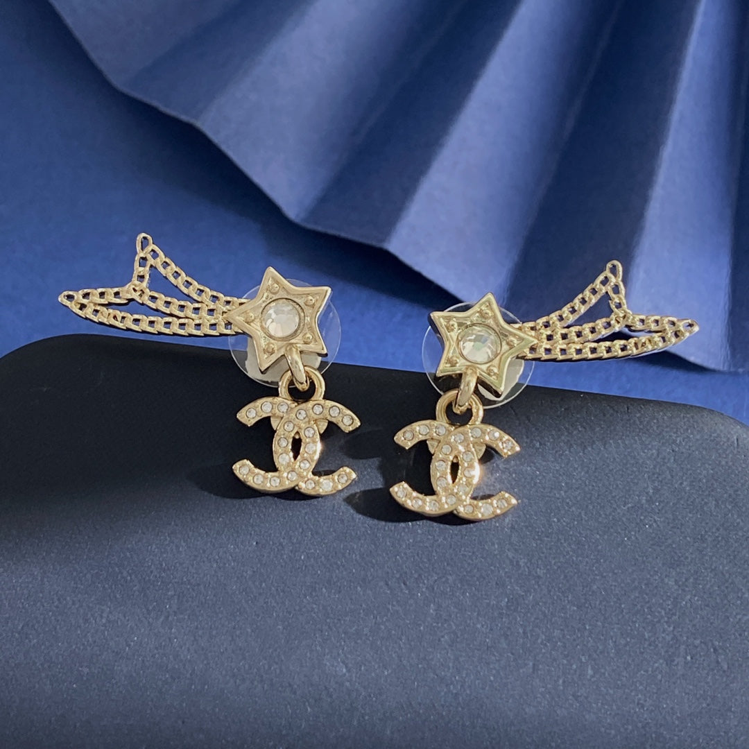 Martin Graham stud earrings in polished metal-tone – styled product view