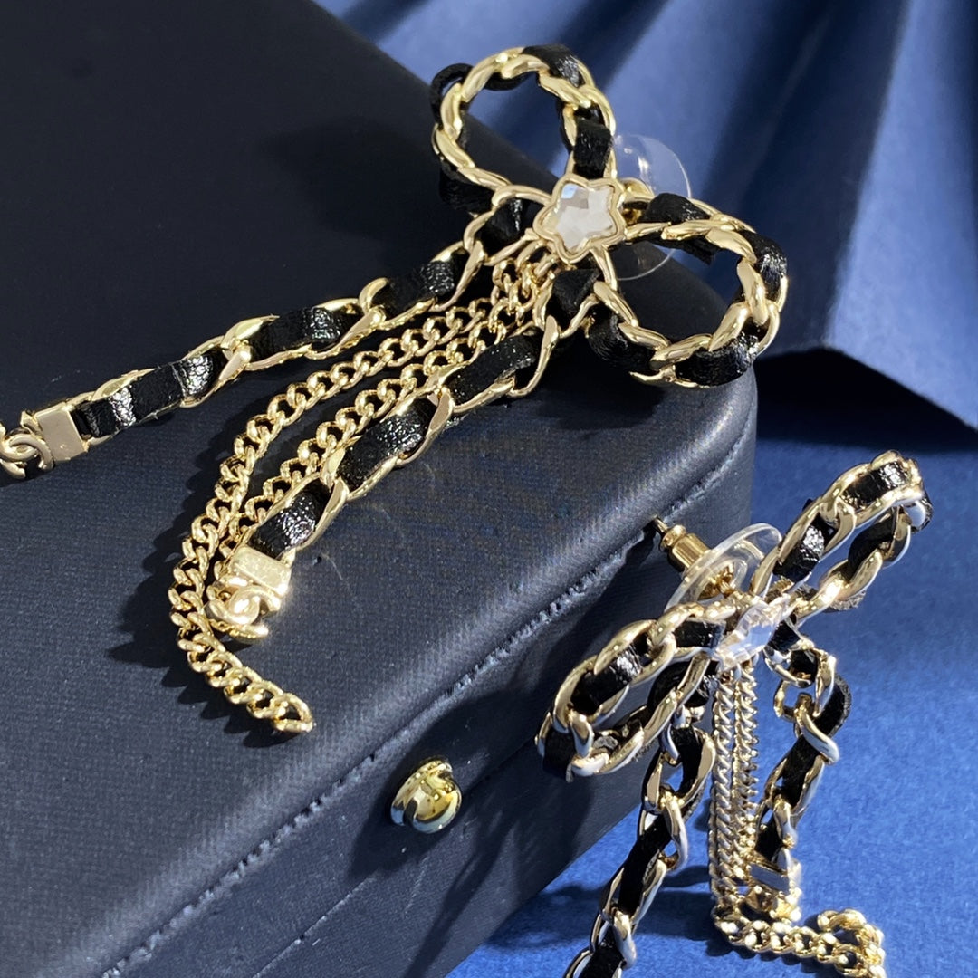 Martin Graham stud earrings in polished metal-tone – styled product view