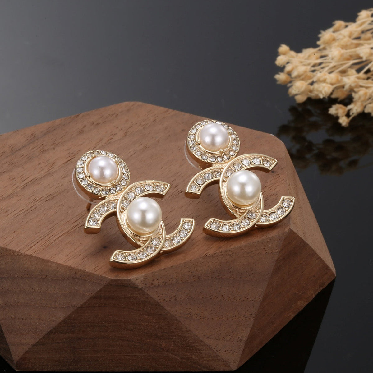 Martin Graham stud earrings in polished metal-tone – styled product view