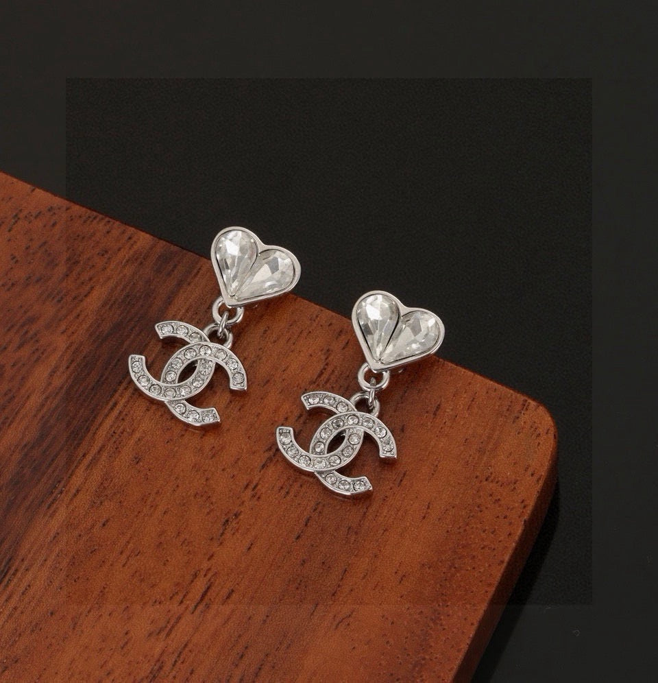 Martin Graham stud earrings in polished metal-tone – side detail