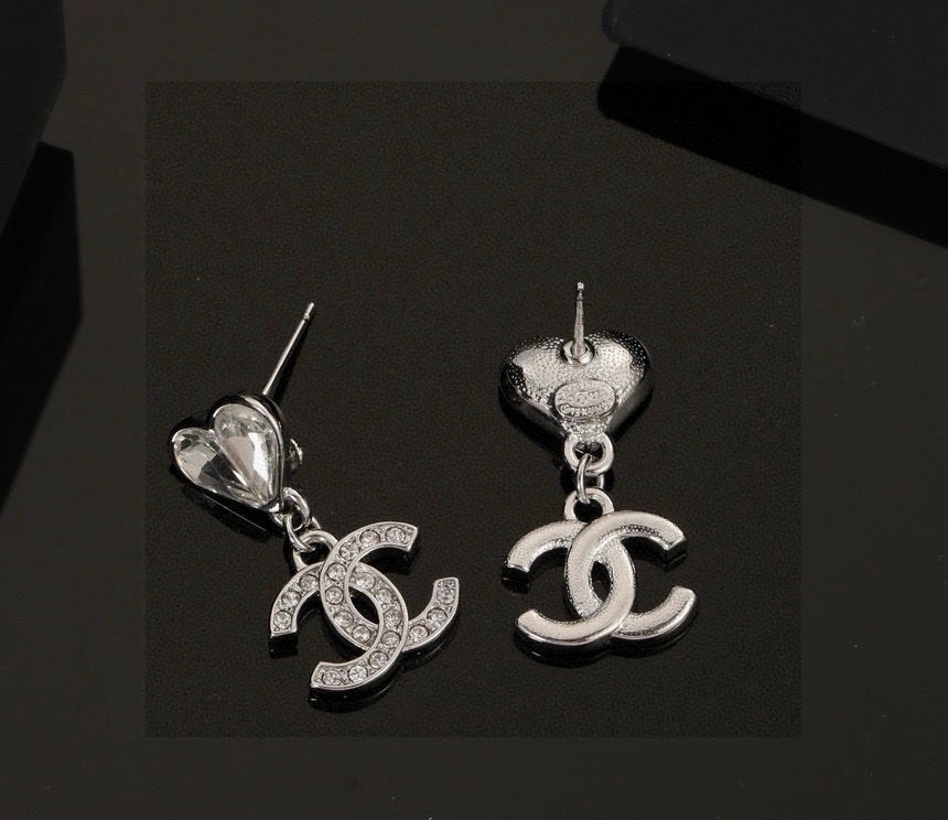 Martin Graham stud earrings in polished metal-tone – main product view