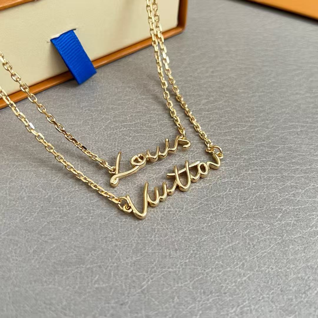 Martin Graham pendant necklace in polished metal-tone – close-up detail