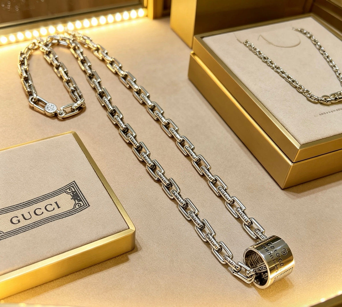 Martin Graham pendant necklace in polished metal-tone – front product view
