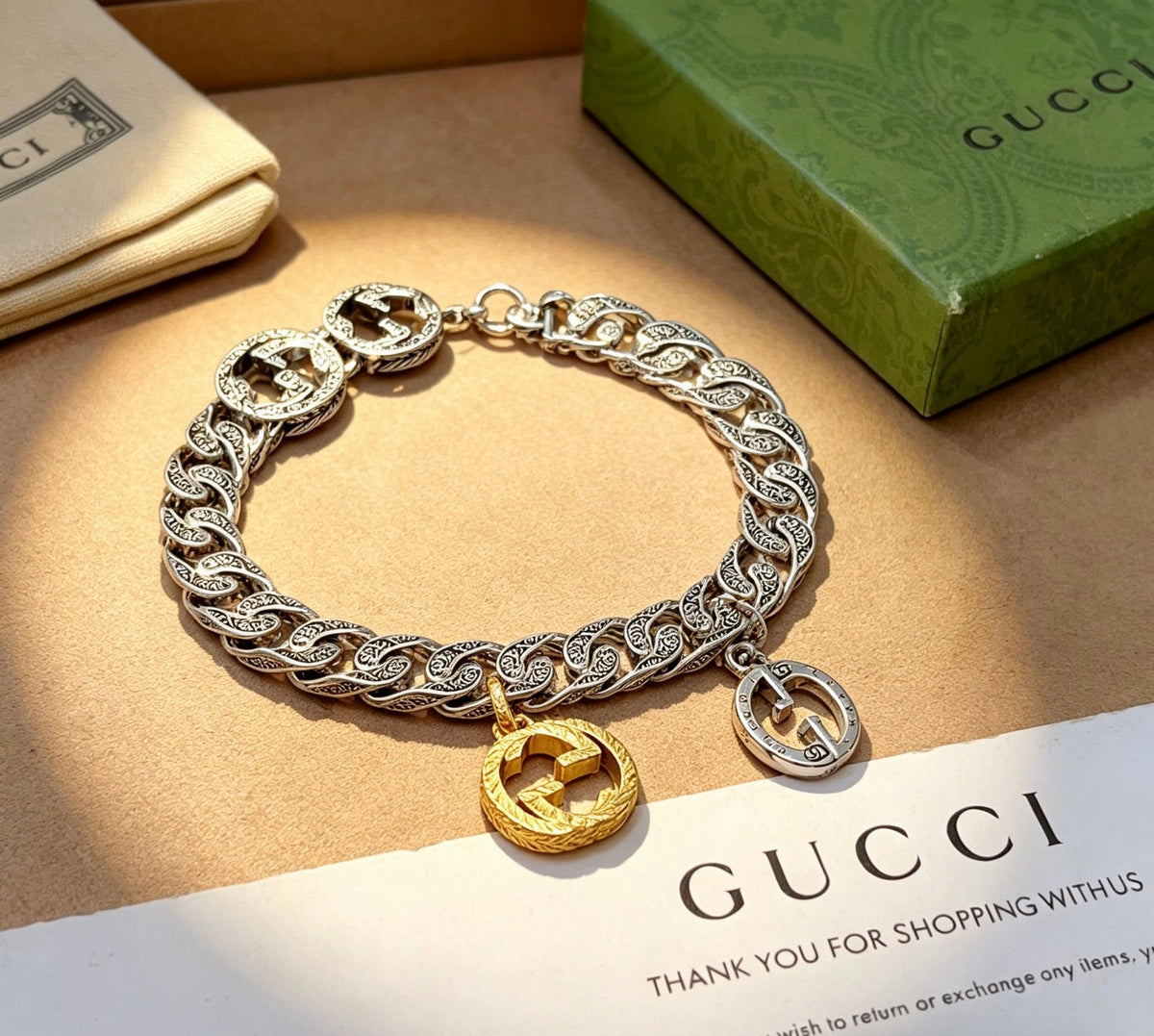 Martin Graham bracelet in polished metal-tone – close-up detail