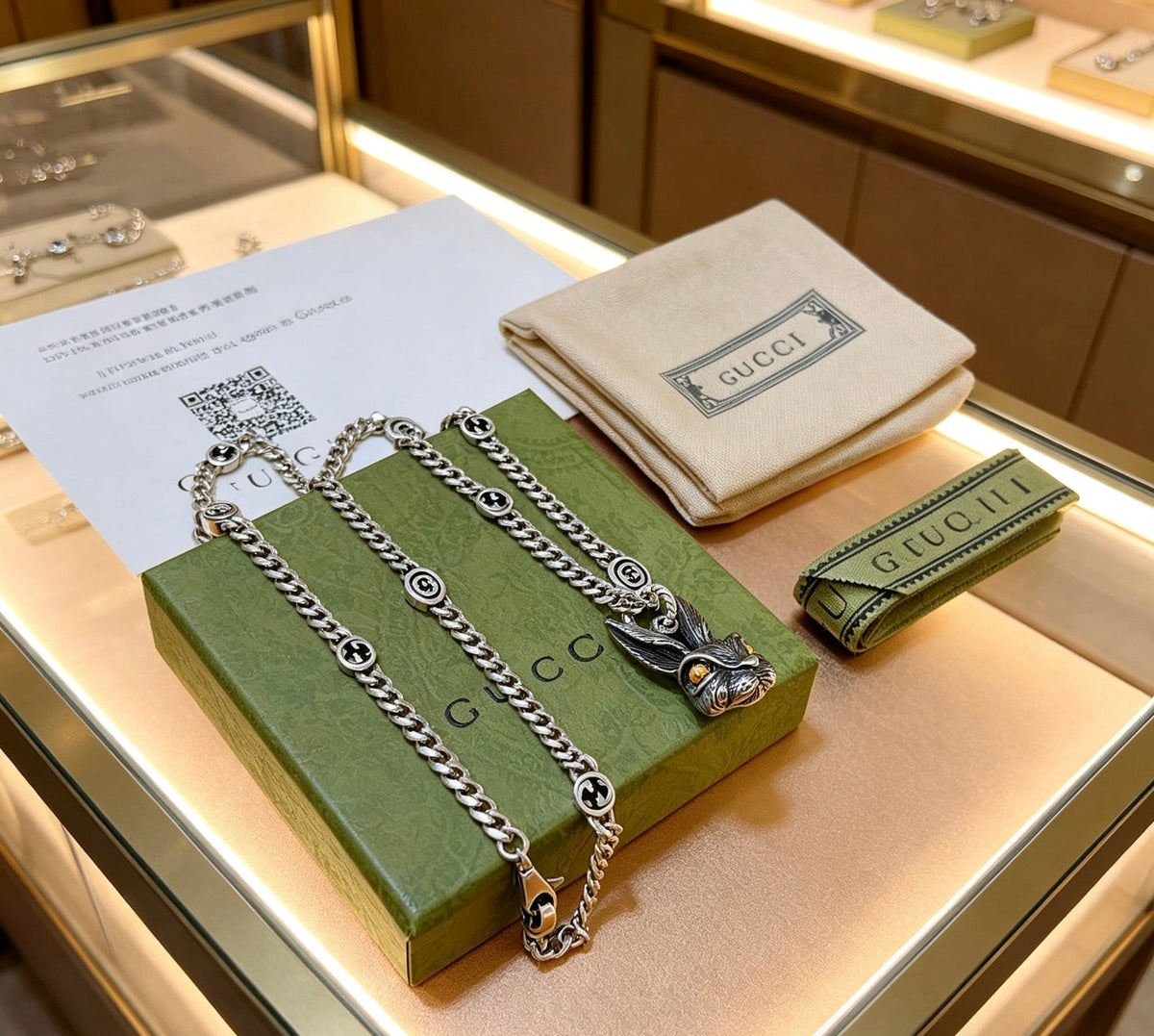 Martin Graham pendant necklace in polished metal-tone – detail view