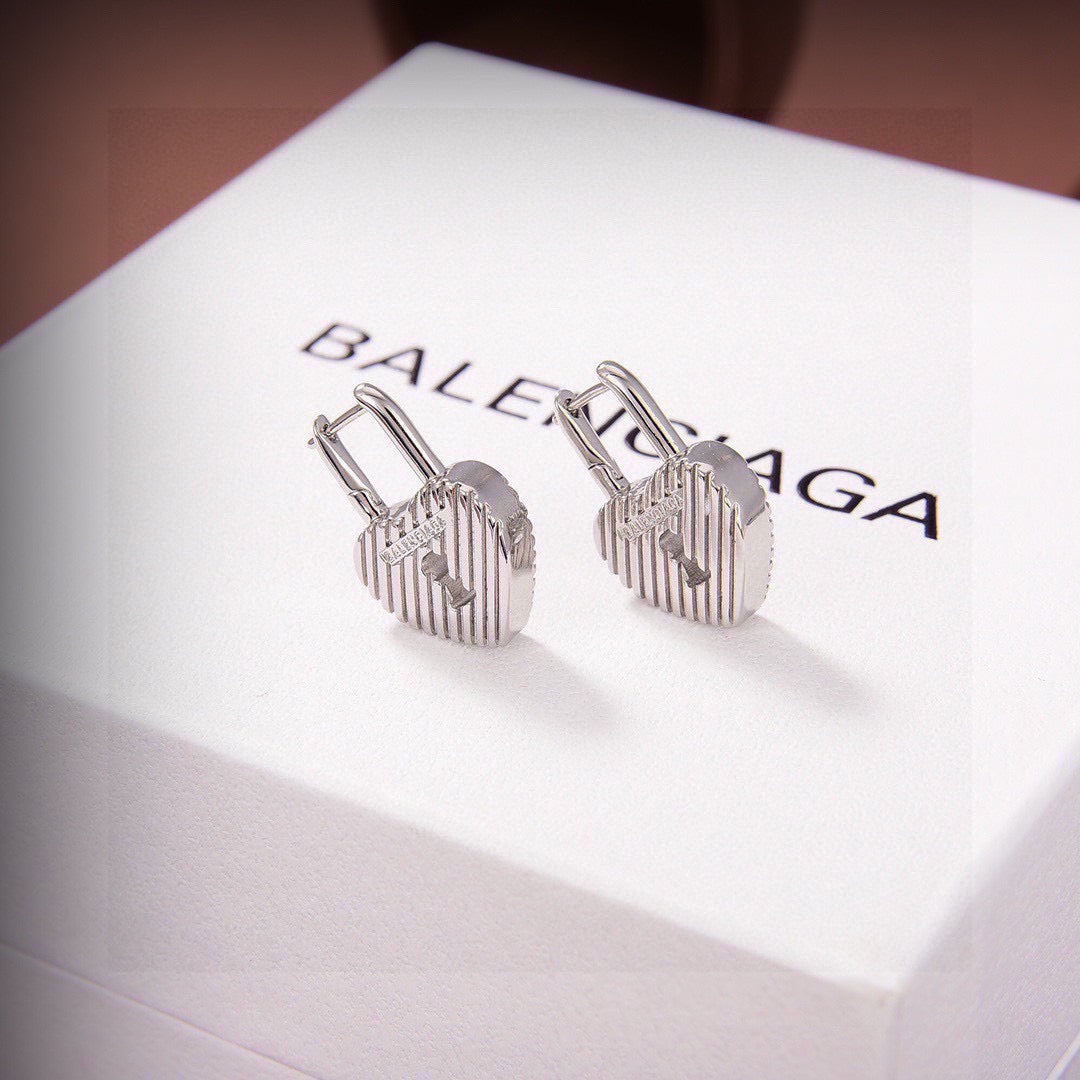Martin Graham earrings in polished metal-tone – front product view