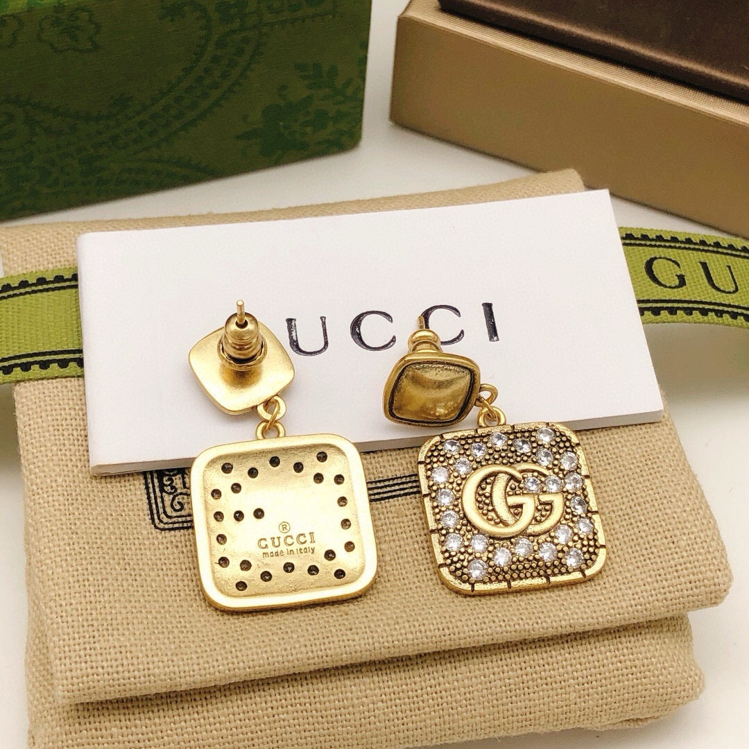 Martin Graham stud earrings in polished metal-tone – main product view