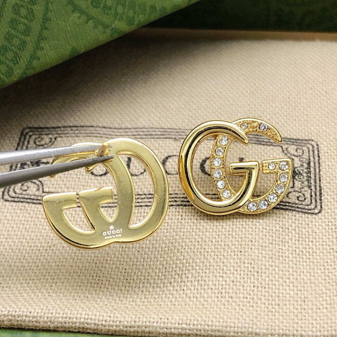 Martin Graham stud earrings in polished metal-tone – front product view