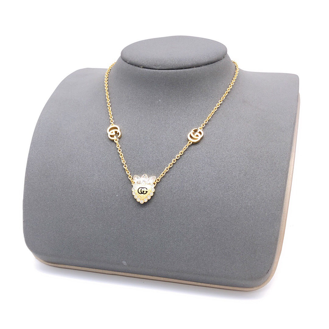 Martin Graham pendant necklace in polished metal-tone – styled product view