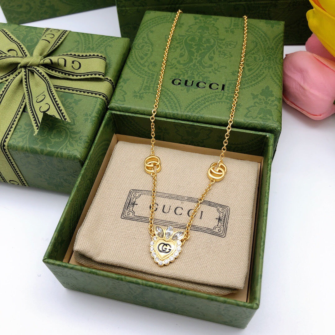 Martin Graham pendant necklace in polished metal-tone – detail view