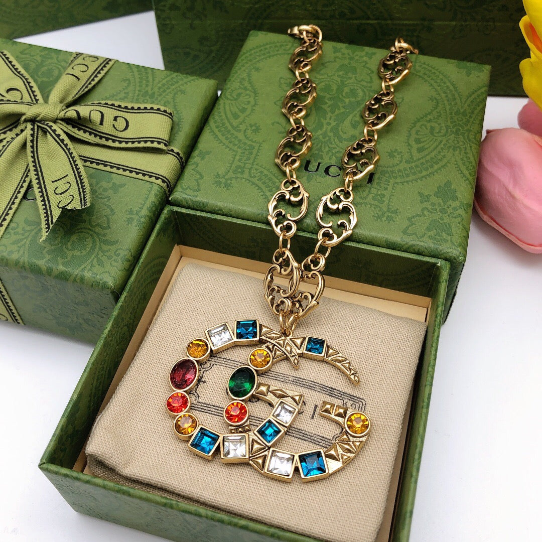 Martin Graham pendant necklace in polished metal-tone – front product view