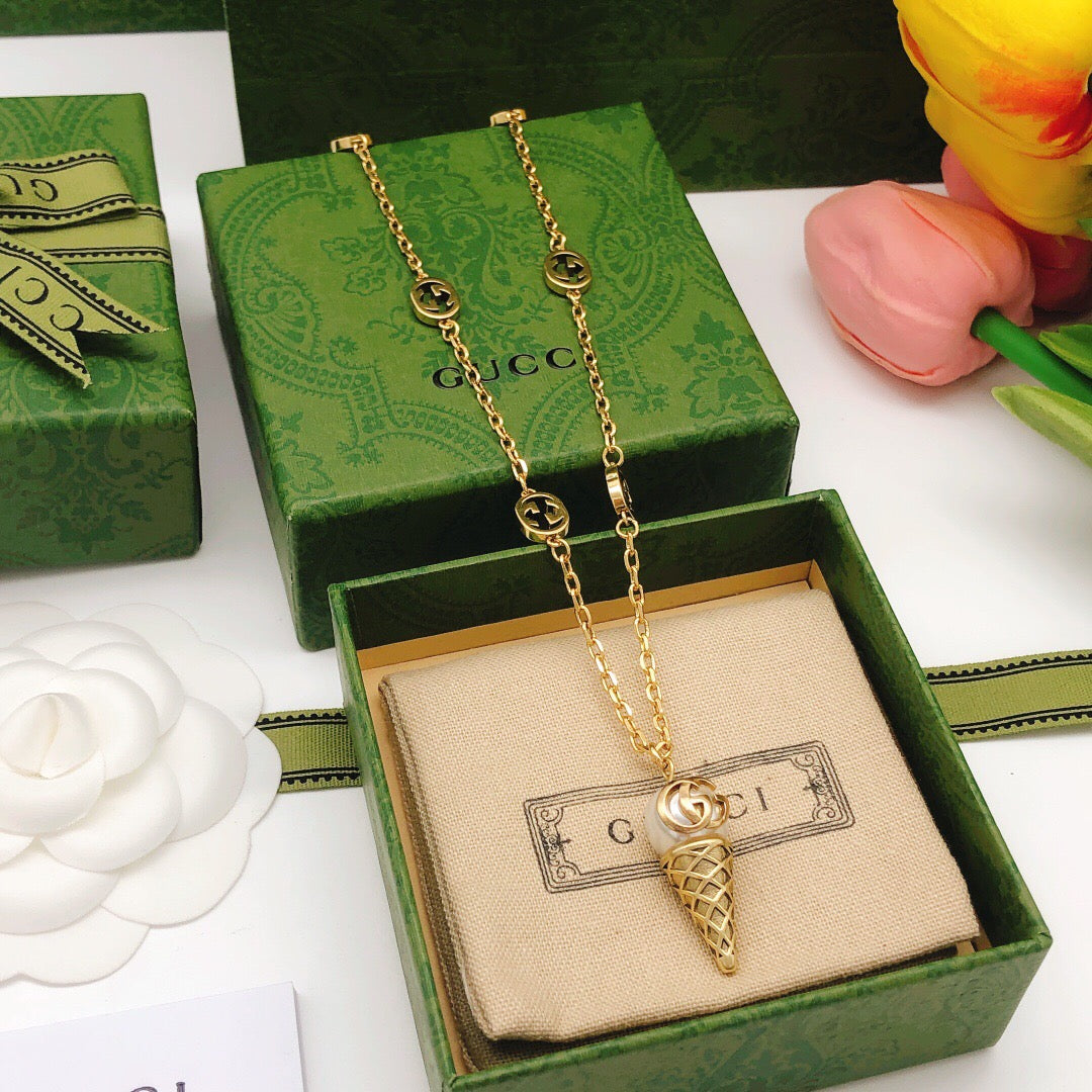 Martin Graham pendant necklace in polished metal-tone – styled product view