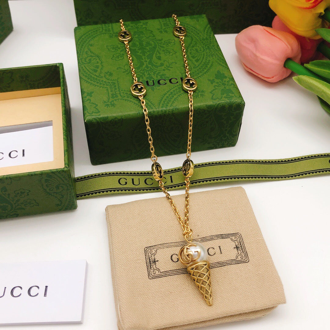 Martin Graham pendant necklace in polished metal-tone – front product view