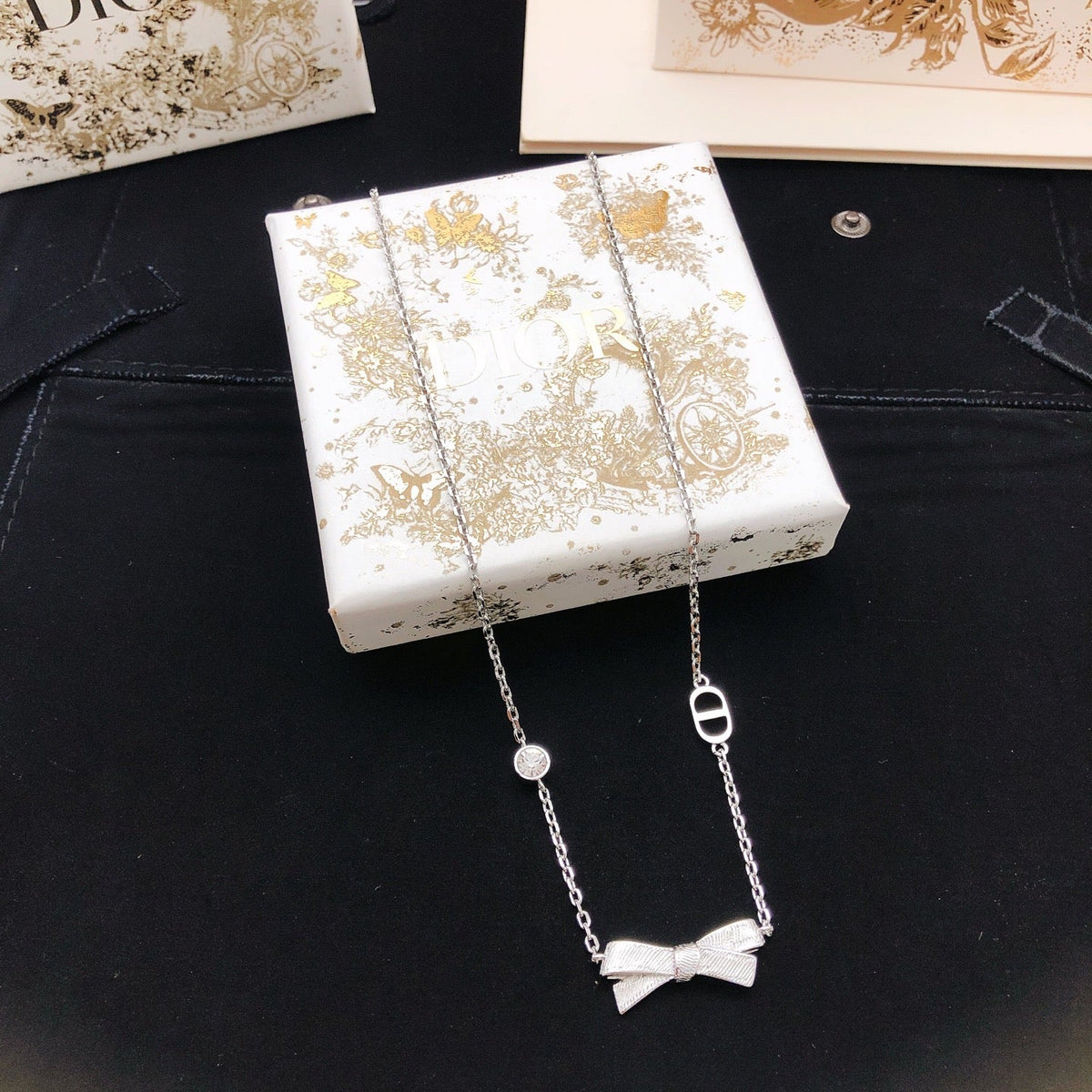Martin Graham pendant necklace in polished metal-tone – detail view