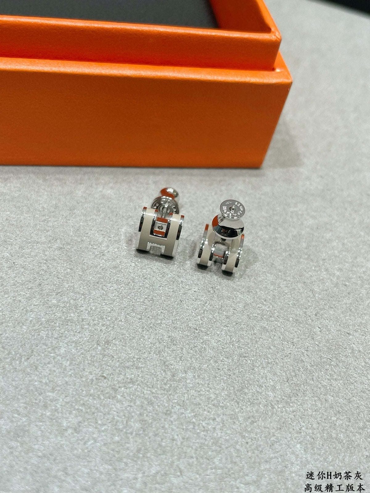 Martin Graham stud earrings in polished metal-tone – main product view