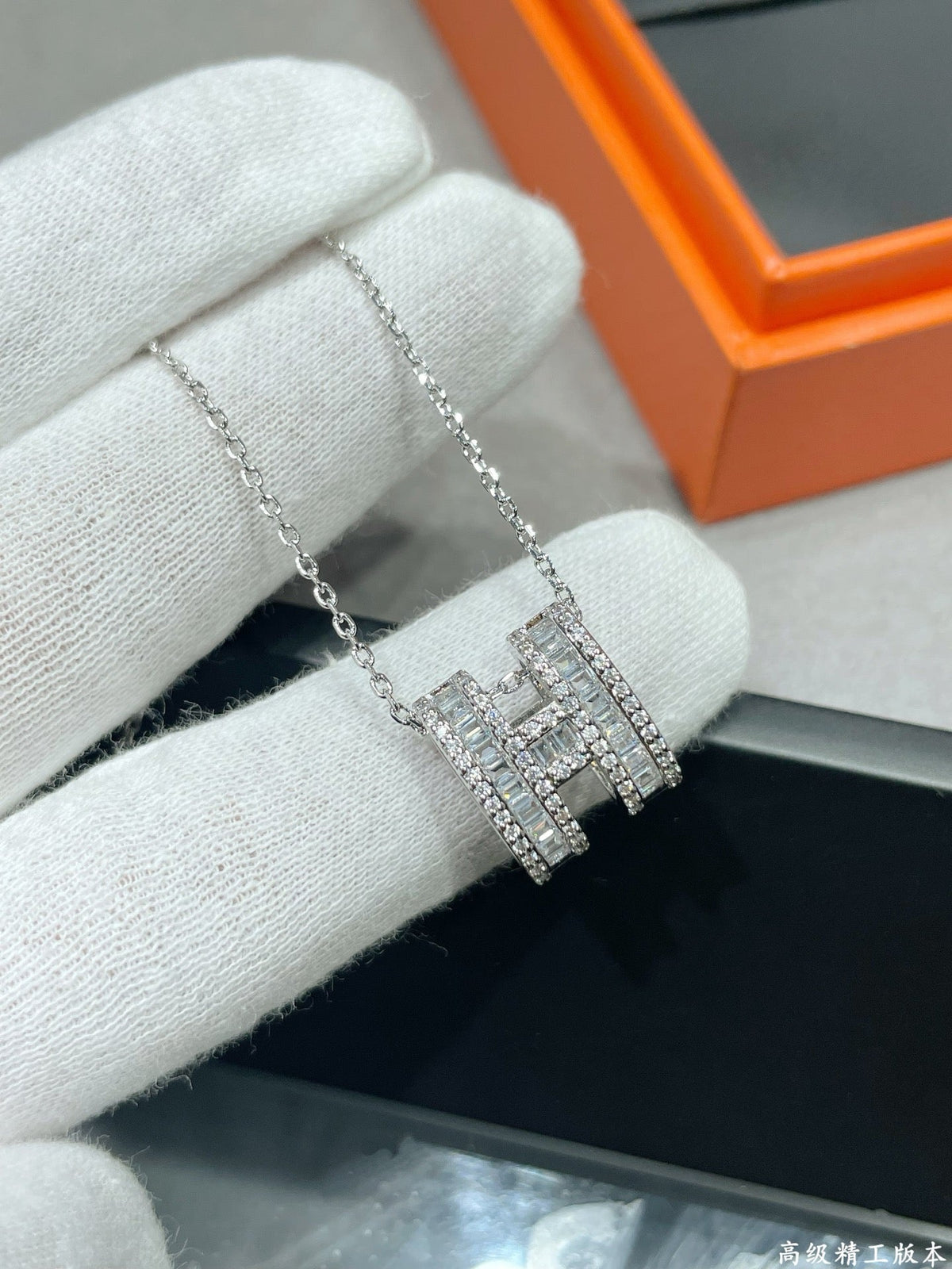 Martin Graham pendant necklace in polished metal-tone – styled product view