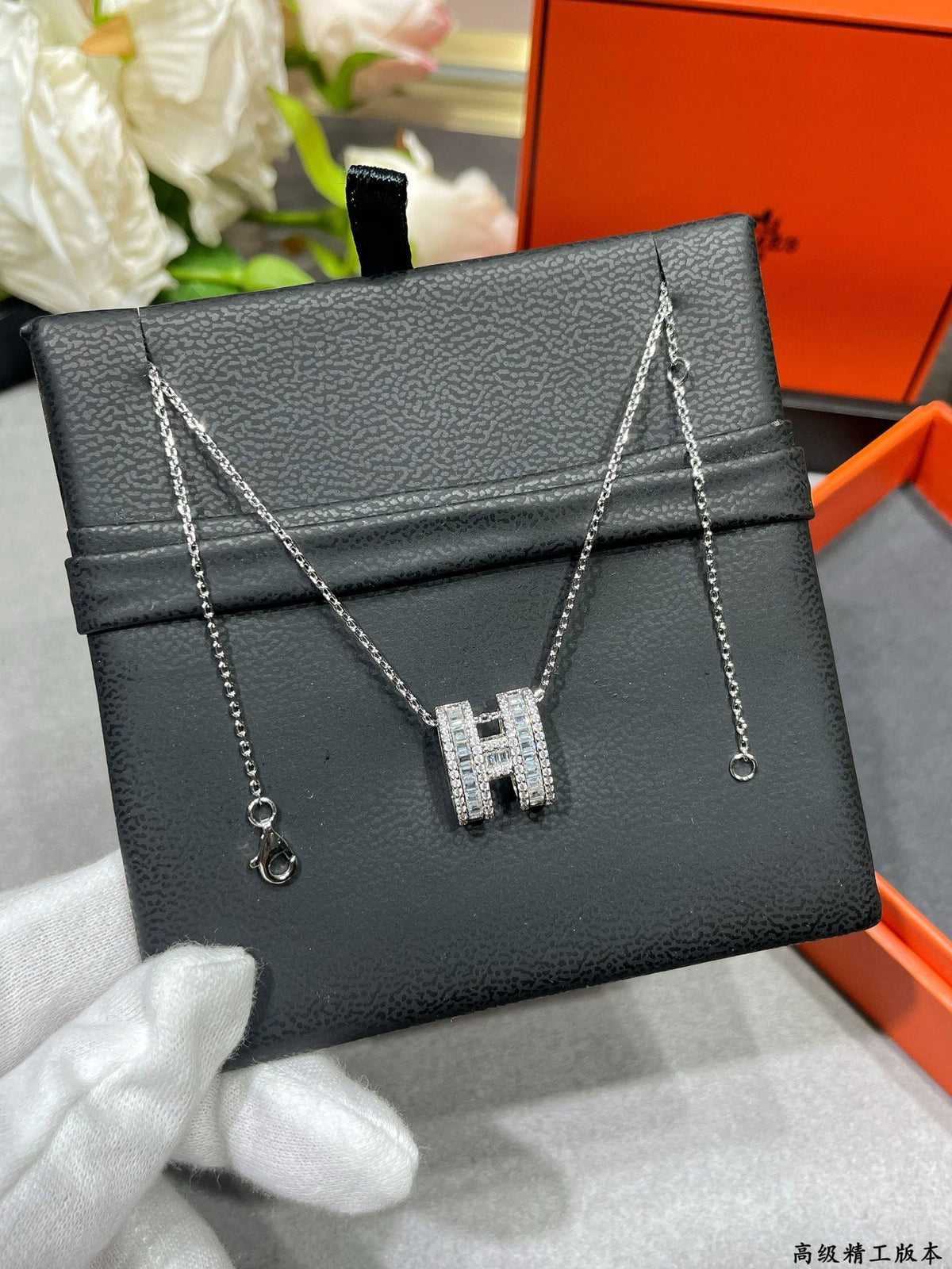 Martin Graham pendant necklace in polished metal-tone – detail view