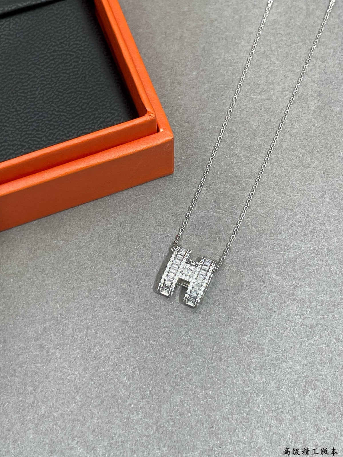 Martin Graham pendant necklace in polished metal-tone – front product view