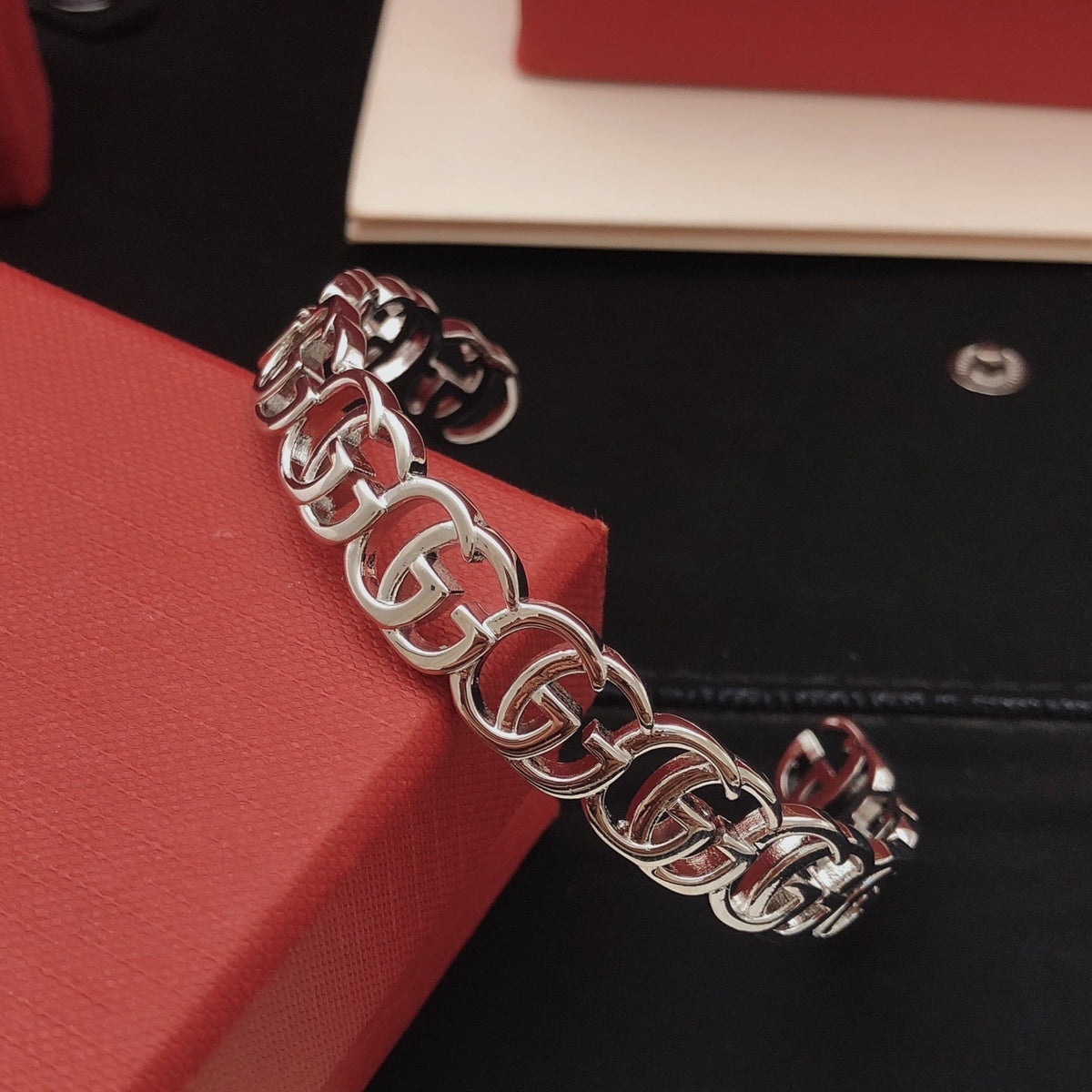 Martin Graham bangle in polished metal-tone – close-up detail